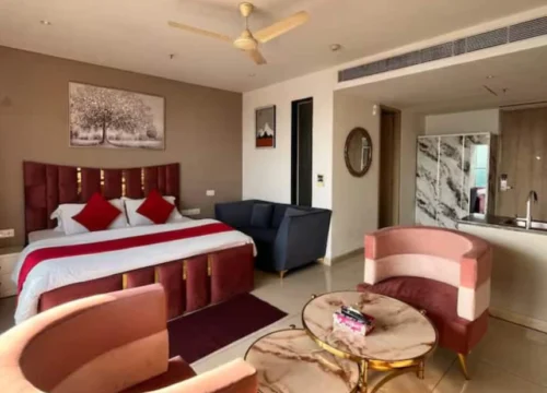 Rose-Hued Studio | Infinity Pool | Private Balcony