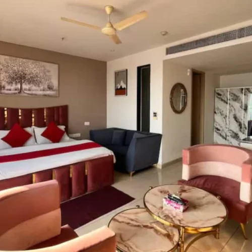 Rose-Hued Studio | Infinity Pool | Private Balcony