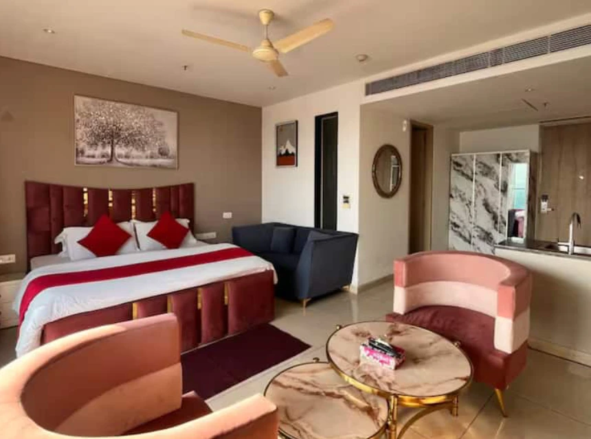 Rose-Hued Studio | Infinity Pool | Private Balcony